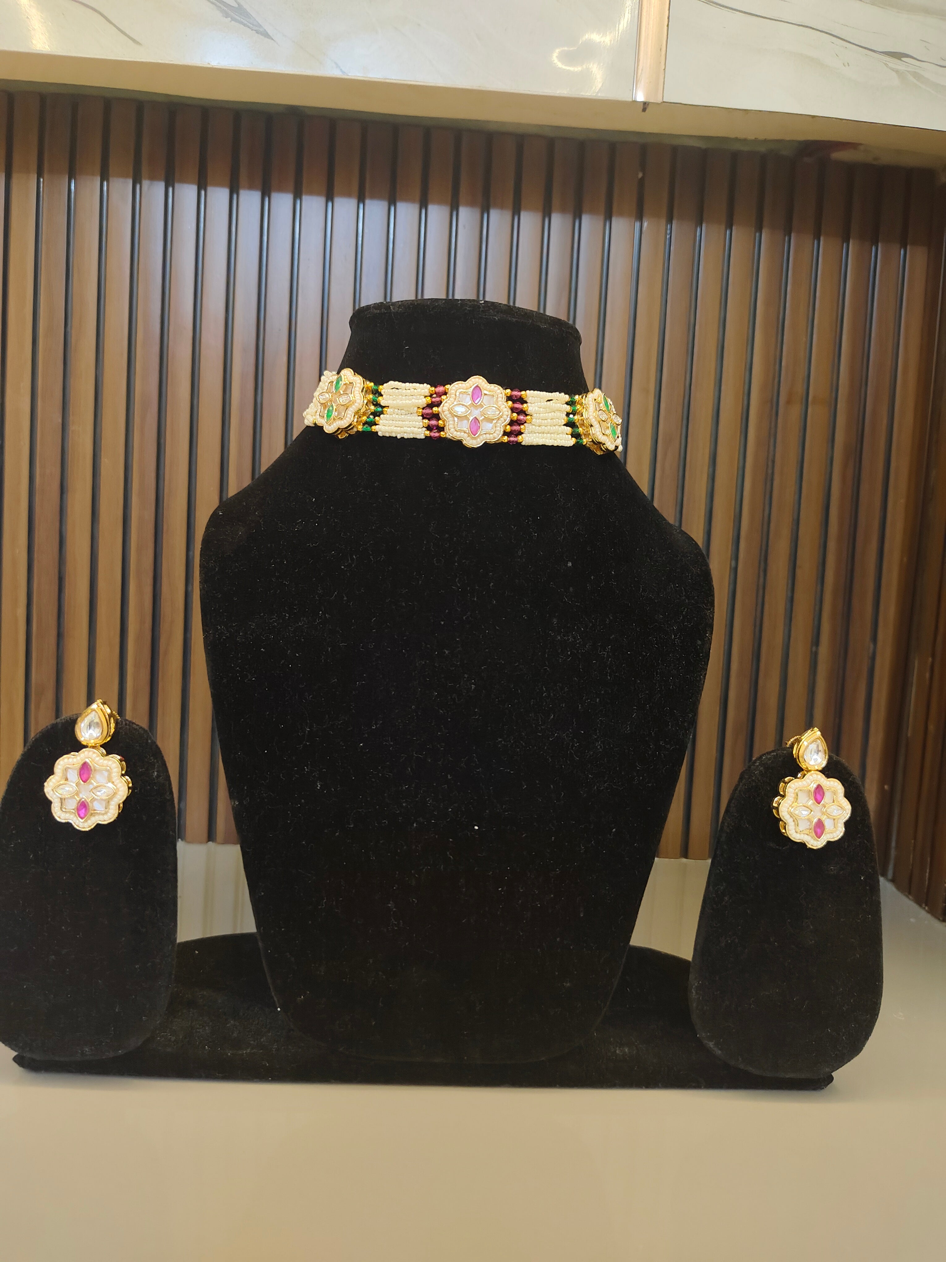 Kundan Floral Choker Set with Emerald Green Stones & Pearl Strings